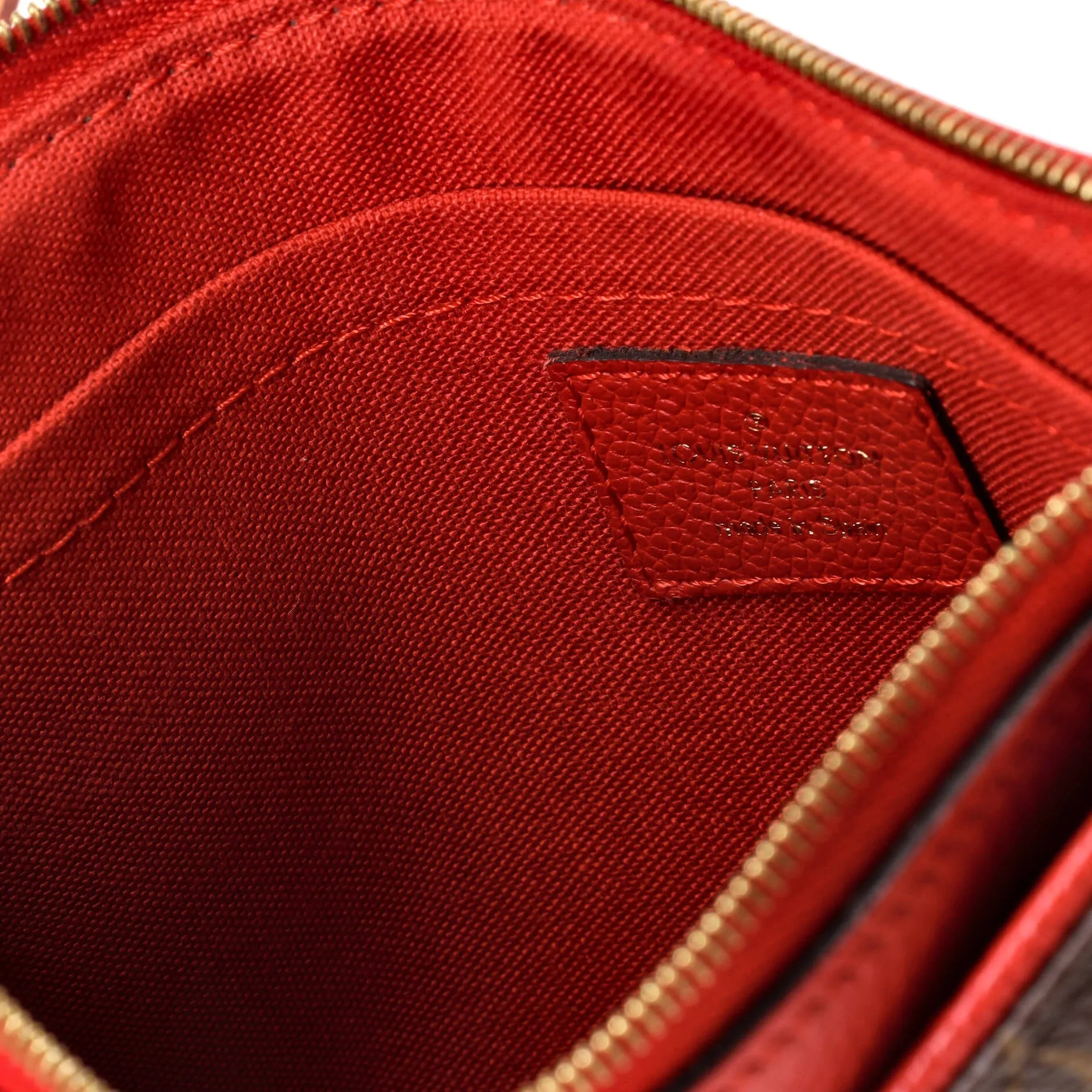 Pallas Clutch Monogram Canvas with Leather
